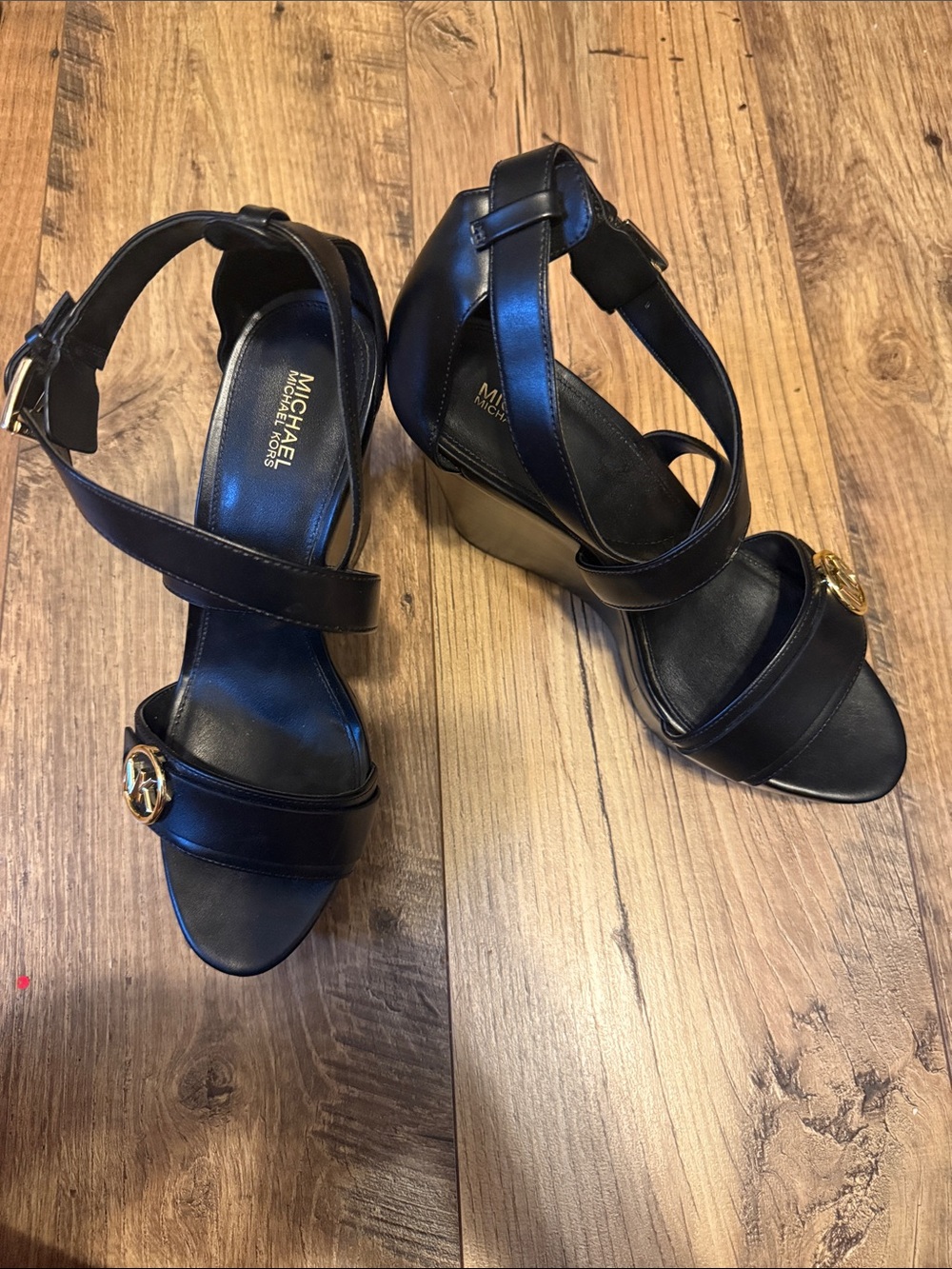 MICHAEL Michael Kors Black Leather Wedge Sandals with Gold MK Accent